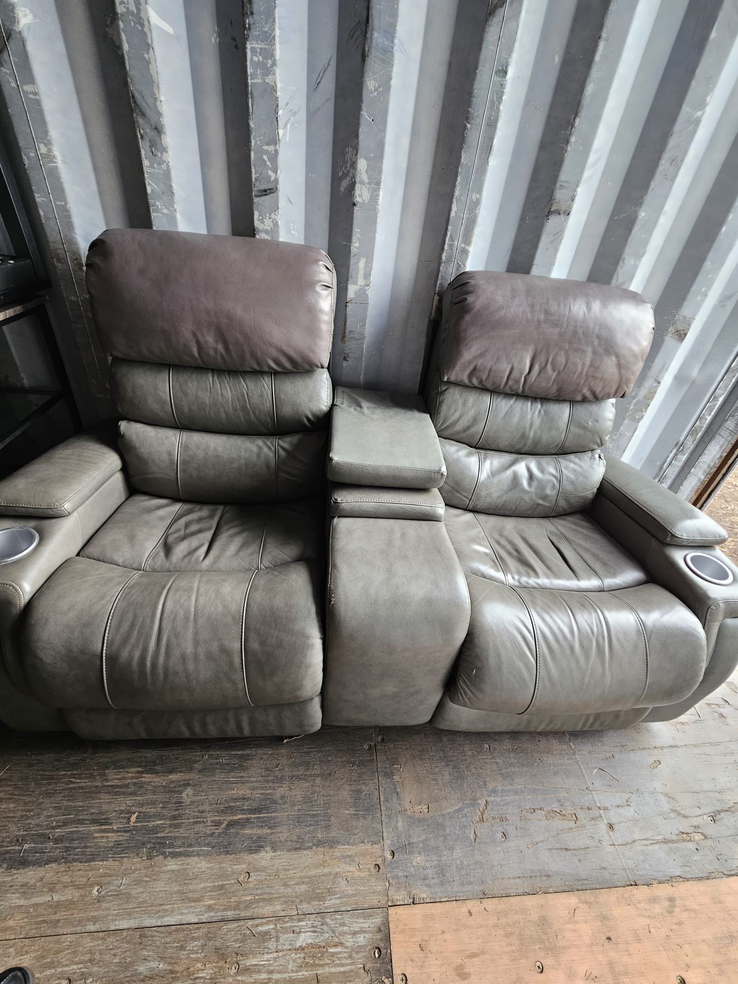 Dwyer Double Reclining Sofa with Center Drop Down Cup Holders