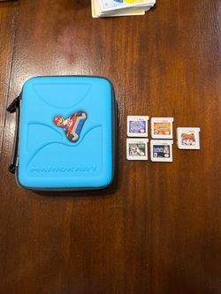 5 Nintendo 3DS games + Mario Kart case.