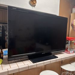 Sharp 60” TV And Sony surround Sound System 