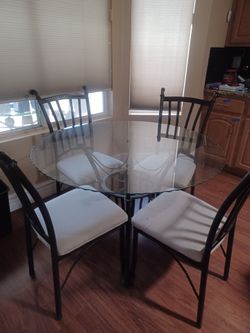 Black Wrought Iron and Beveled Glass Table and Chairs