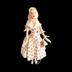 the "Incognito" Gene Marshall doll, created by artist Mel Odom and produced by the Ashton-Drake Galleries. The doll was released in 1998 as part of th