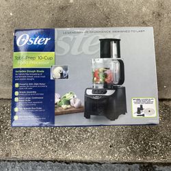 The product is the Oster Total Prep 10-Cup Food Processor (model FPSTFP1355).