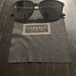 Sunglasses comes with Versace towel