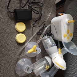 Medela Pump in Style Breastpump Stools. Used. The pump works good, but it has a crack which was taped. 
