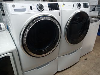 GE front load washer and dryer set on pedestals - Free delivery