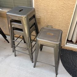 4 metal stools