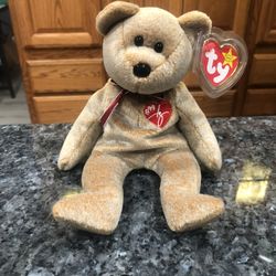 Ty Beanie Babie “Signature Bear”. 1999.  Brand New Size 7 inches Tall . Brand New With Tags 