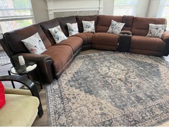 Brown L recliner couch