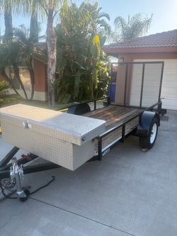 Utility trailer 5x10x1 Pink in my name with tool box and with LED lights with 5x4 ramp