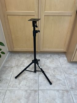 Adjustable Stand With A Plate For Working