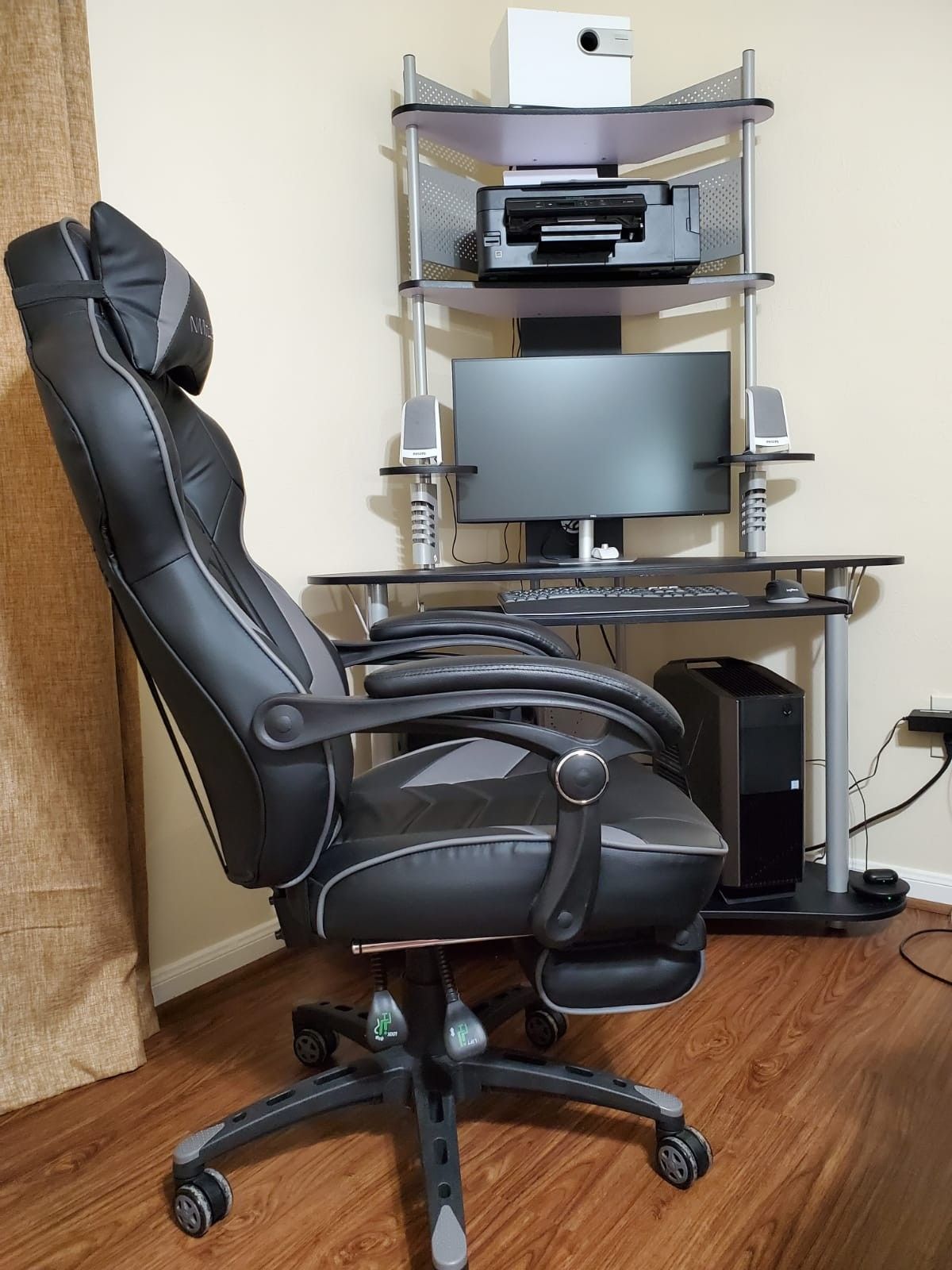 Desktop computer with table and chair included.