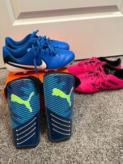 2 soccer cleats and chin guards $30