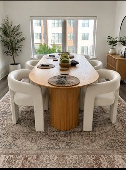 Oval Wood Dining Table with Ribbed Pedestal Legs