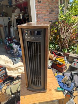 Oscillating fan room heater. Works perf!