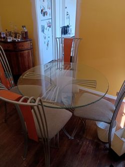 Round glass table and 4 chairs