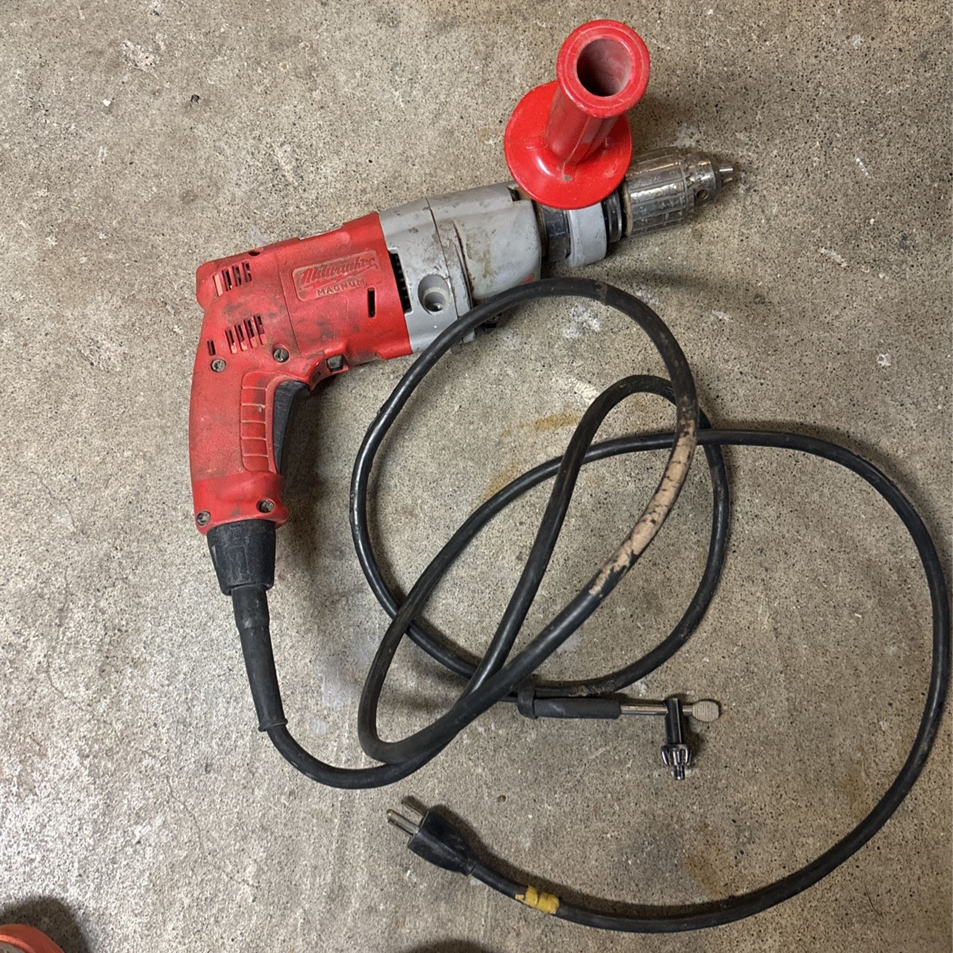 Milwaukee heavy duty corded, Roto hammer or drill works great