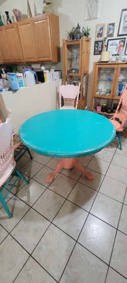 Wooden table and glass table top , chairs