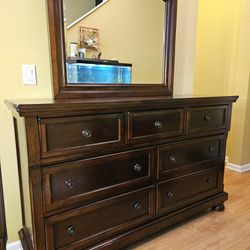 Clean and Nice 7 Drawer Dresser + Mirror + One Nightstand. 