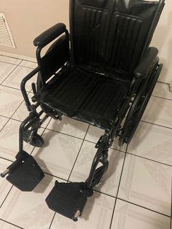 Black Folding Wheelchair with Footrests