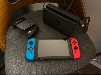 Nintendo Switch with Neon Blue and Neon Red Joy-Con - Handheld Gaming Console + Controller Accessories Bundle + Nintendo Switch Case