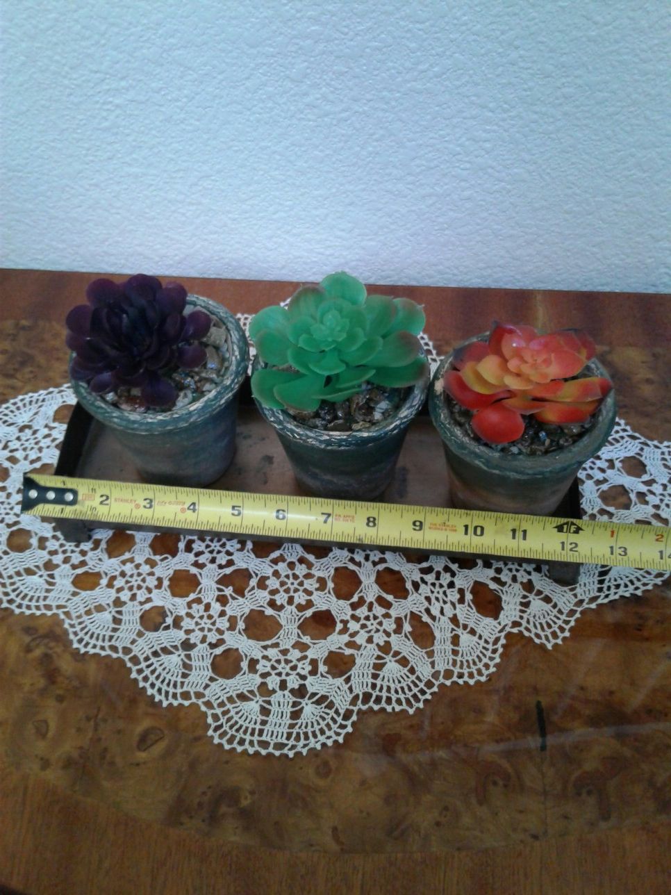 Artificial succulents in 3 small ceramic pots with metal tray. $15 OR BEST OFFER