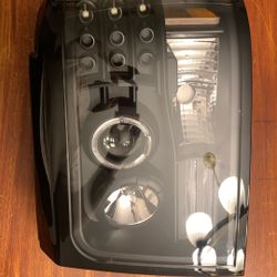 Auto Headlight/Tail Light Assemblies