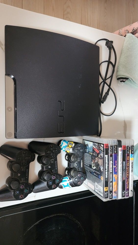 Ps3 W/ 3 Controllers And 7 Games