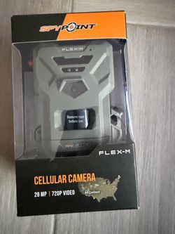 New SpyPoint FLEX-M cellular camera has a 28 MP photo resolution and 720p video with sound. This olive green device features a 0.4s trigger speed and 