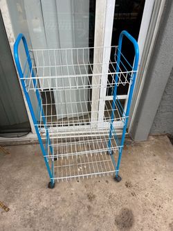 Rolling rack 34 inches tall 16 inches long 9 inches wide