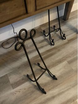 Three wrought iron frame holders