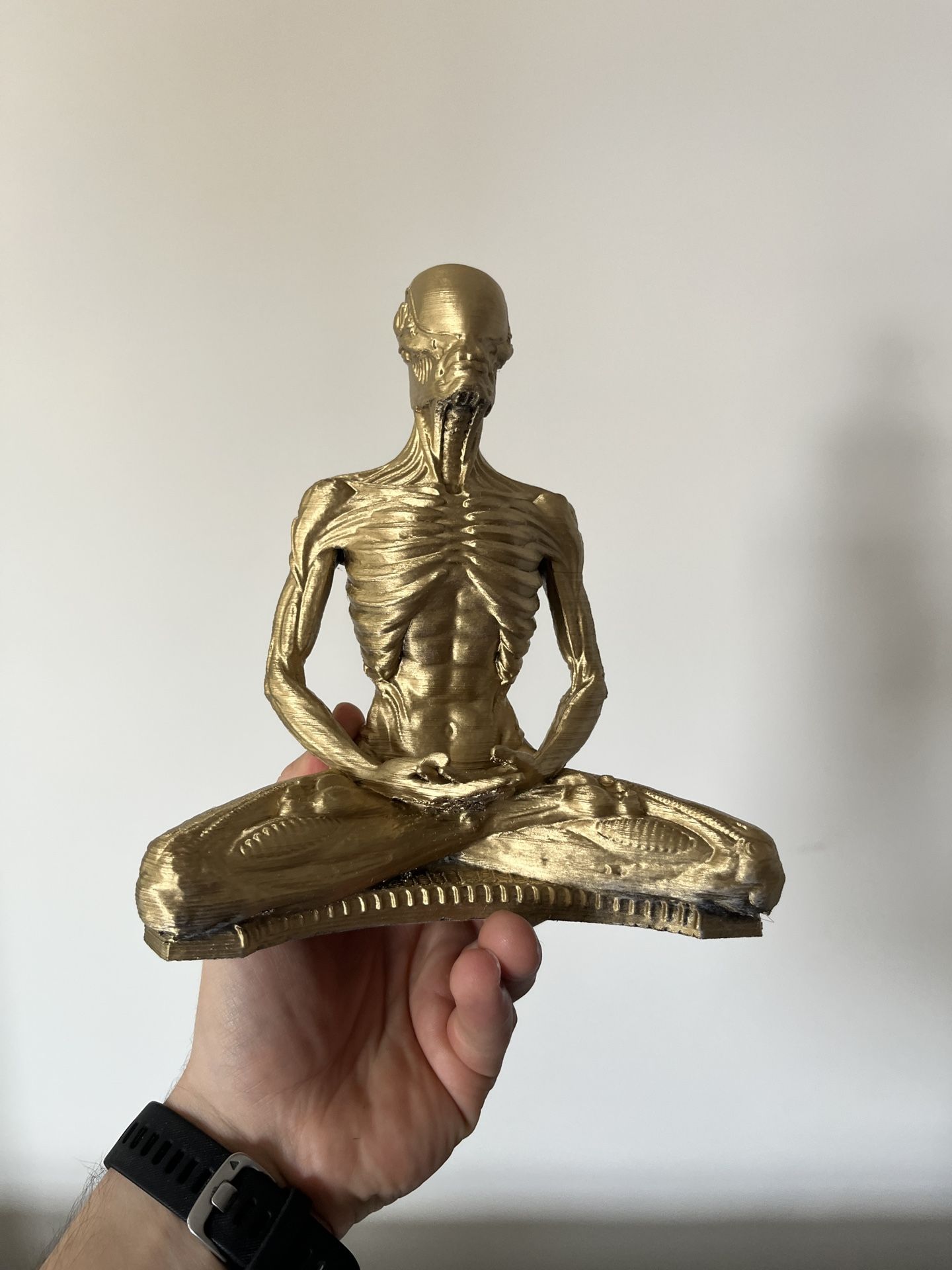 Golden Alien Buddha Statue.