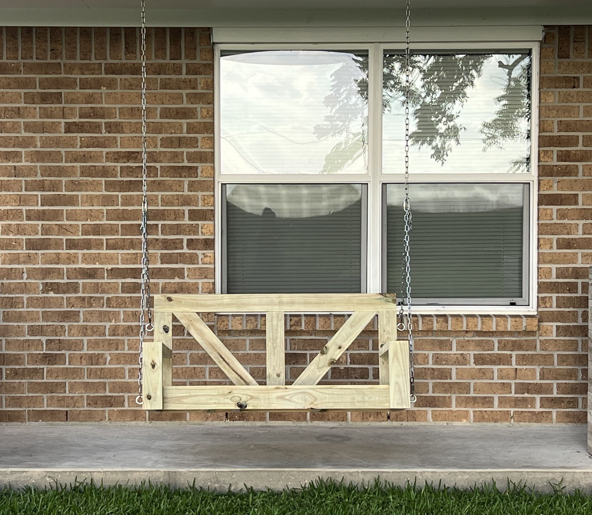 Farmhouse Front Porch Swings Made With Treated Wood