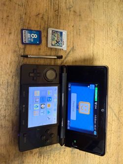 Nintendo 3DS with Pokémon X and SD Card