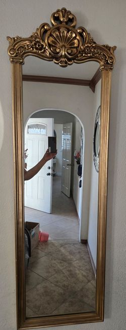 Ornate vintage-style gold gilt wall mirror
