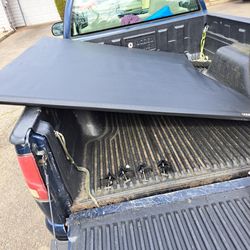 Tonto cover for colorado truck try fold sixty five and a half inches long and fifty nine and a half inches wide , great , great shape