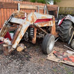 Agriculture tractor with a front load