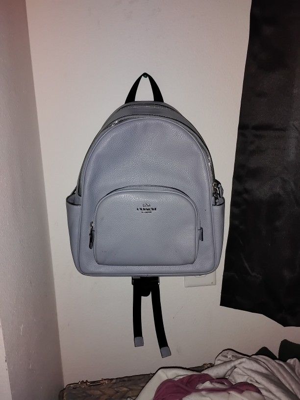 light blue Coach backpack