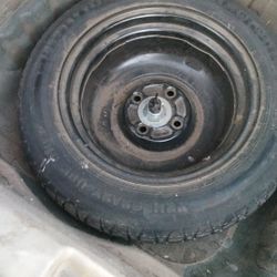 Donut Tire  w/rim ...Size for Like a 1993 Honda Accord $15o.b.o. 