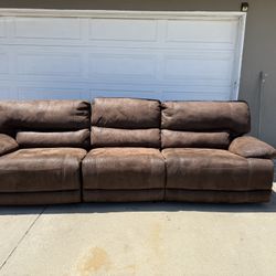 Brown Plug In Reclining Couch