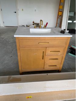 Brand new Carmel oak 36 inch bathroom vanity