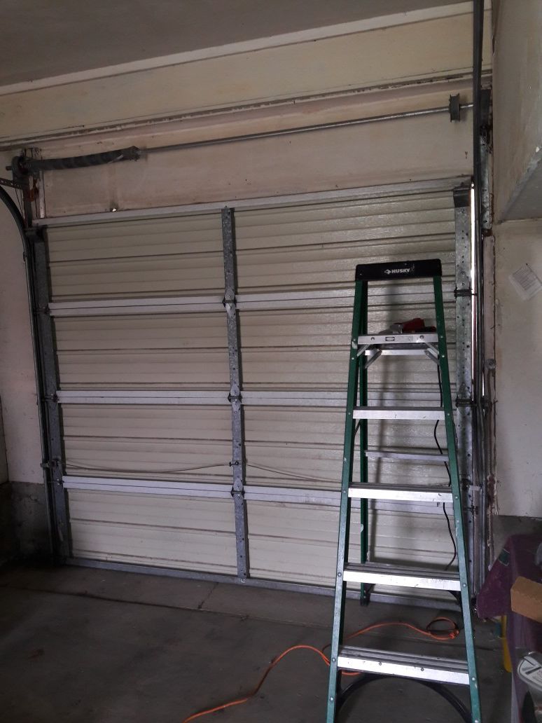 Steel garage door 8'2"Wide x 7 feet tall