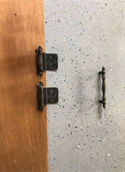 Hinges and handles for cabinet doors