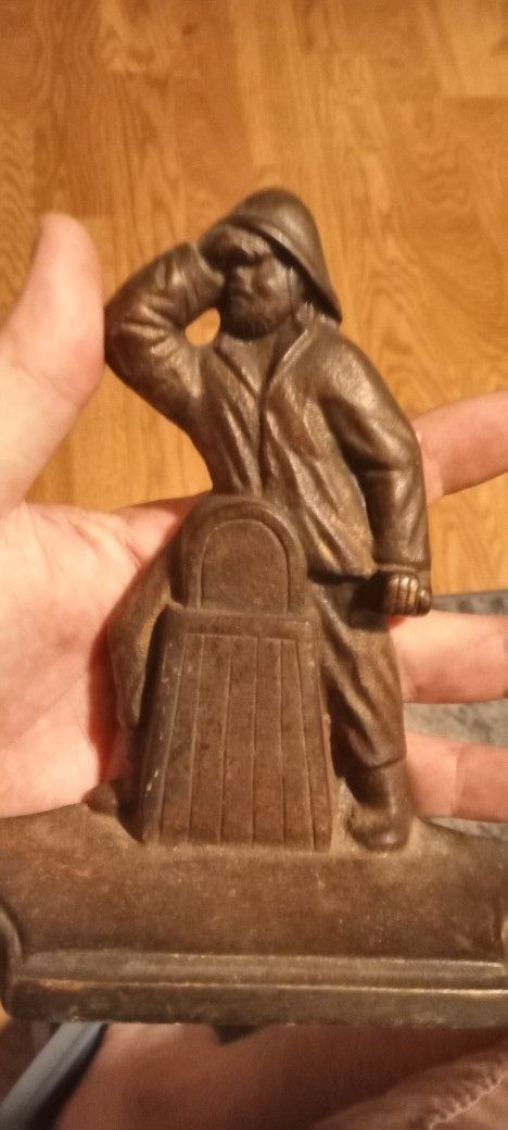 Vintage Cast Iron Fisherman