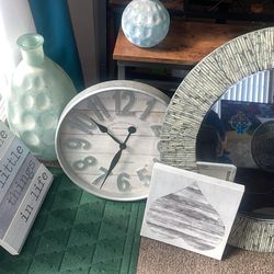 Espejo reloc y cuadros