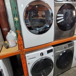 New LG Front Load Washer And Stackable Gas Dryer Set 
