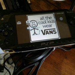 Psp 1001 With Charger.  No Battery Cover. Bottom Knob Missing 