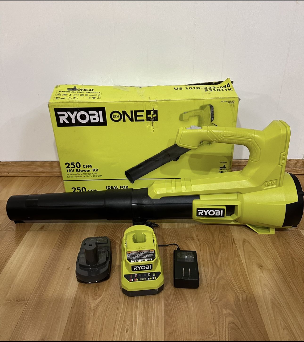 RYOBI ONE+ 18V 90 MPH 250 CFM Cordless Battery Leaf Blower/Sweeper with 2.0 Ah Battery and Charger