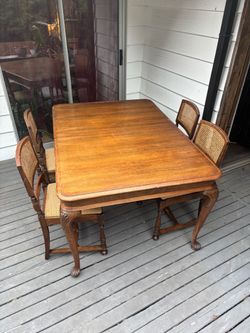Dining room table + four chairs