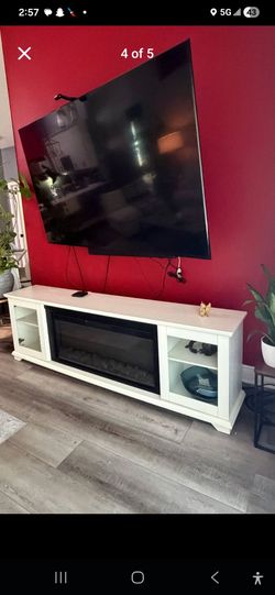 Elegant White TV Console with Electric Fireplace
