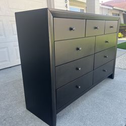 Black 9 drawer drawer with brass knobs
